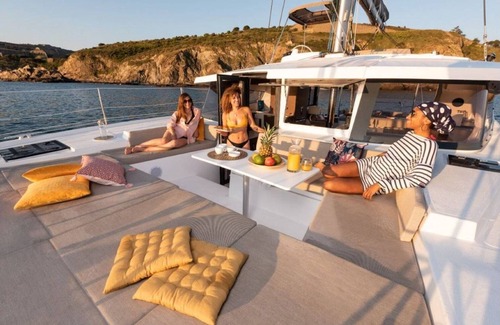 Portisco Boat Rental | Boat 'Catamarano 43 Foil E Kite Equipment' with Sea View, Wi-Fi and Air Conditioning
