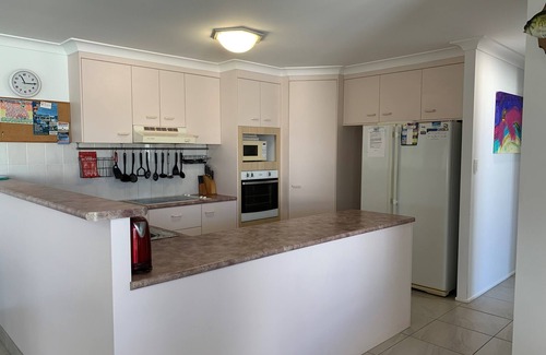 Banksia Beach House | BOATHOUND PACIFIC HARBOUR On The Canal and Pet Friendly