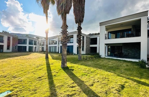 Bodrum Apartment | Bodrum Bağla Denize Sıfır Bahçe Kat 2+1 Daire