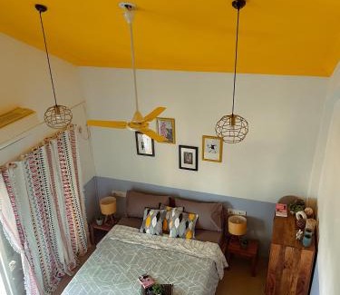 Siolim Apartment | Boho chic coastal getaway with charming attic
