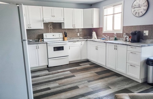 Timmins Apartment | Boho Retreat - Private 3 Beds, 1 Bath