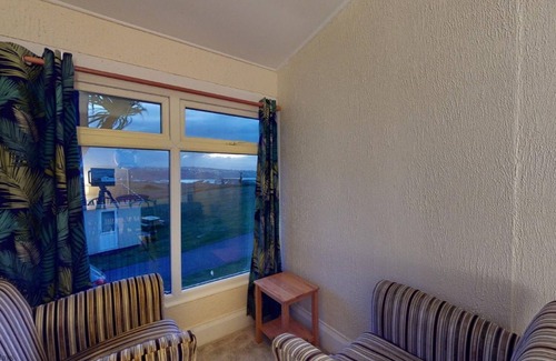 Hayle Ski Chalet | Bojago soaks up the evening sun, which can be enjoyed from an elevated rear garden. Sea Views.