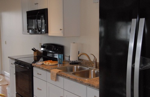 Southwest Harbor Condo | Book your perfect fall getaway at the Cannery's Marina-side condo Stern unit!