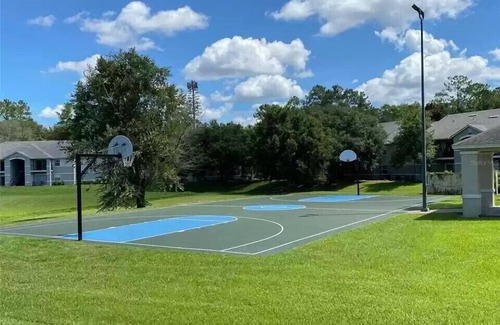 Gainesville Condo | Botanical Retreat: King Comfort & Poolside Peace
