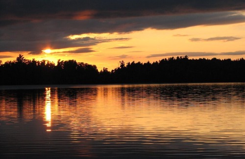Grand Marais House | Boundary Waters Log Cabin on McFarland Lake BWCA ~ Pontoon Sauna Canoe Fire Pit