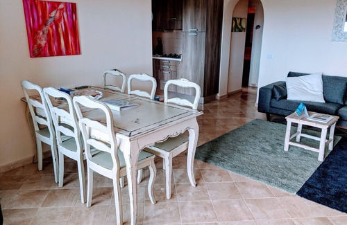 Porto Pozzo Apartment | Boutique Seaview Apartment with large pool and private garden.