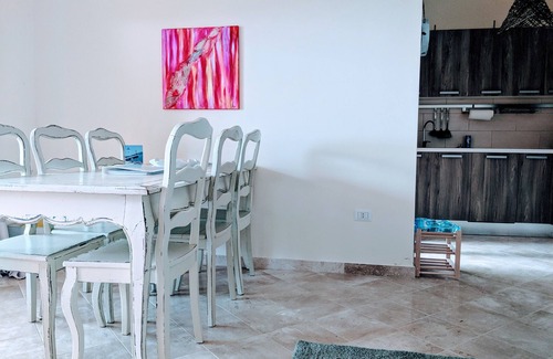 Porto Pozzo Apartment | Boutique Seaview Apartment with large pool and private garden.