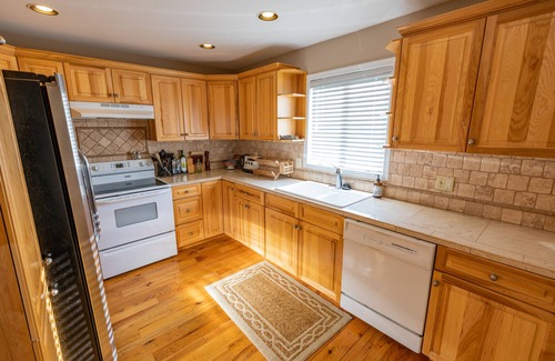 Bozeman House | Bozeman Summer Rental in Quiet Family Neighborhood with Community Pond.