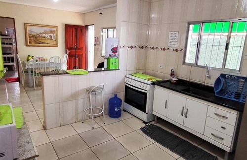 Jardim Itapoan House | House with swimming pool with LED, waterfall, barbecue, vertical garden