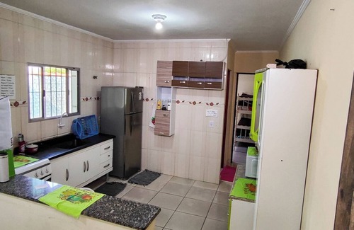 Jardim Itapoan House | House with swimming pool with LED, waterfall, barbecue, vertical garden