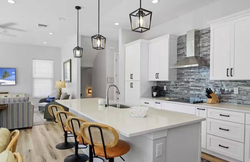 Fort Myers Beach House | Brand new custom home STEPS from the beach and times square - Unbelievable bay views, stunning pool and spa and large entertaining space!