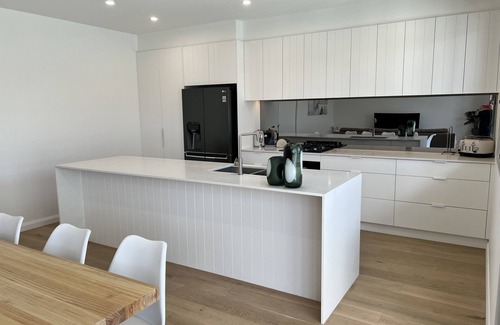 Rye House | Brand new family beach house, 150m from shops & beach with pool!