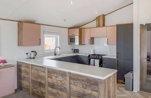 Newton Stewart Ski Chalet | Brand new for 2025. Aurora lounge is comfortable and flexible.