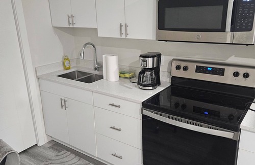 Regina House | Brand new, fully furnished suite in a serene East Regina neighborhood The Towns.