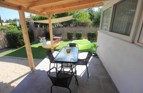 Skafidia House | Brand new house with garden, next to the beach