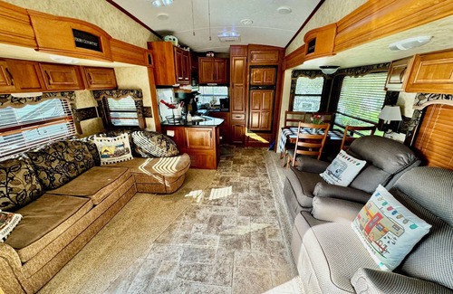 Gatlinburg - Pigeon Forge House | Brand New List! Beautiful RV on Creekfront lot. Amenities galore. Lot 311