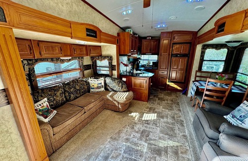 Gatlinburg - Pigeon Forge House | Brand New List! Beautiful RV on Creekfront lot. Amenities galore. Lot 311