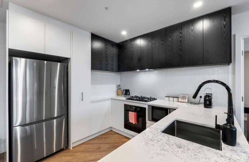 Southport Apartment | Brand NEW LUX 2BR at Regal | Terrace Pool & GYM