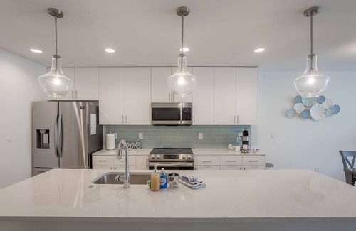 Madeira Beach Condo | BRAND NEW LUXURY CONDO WITH HEATED POOL - 1 BLOCK FROM GULF W/WATER VIEWS!