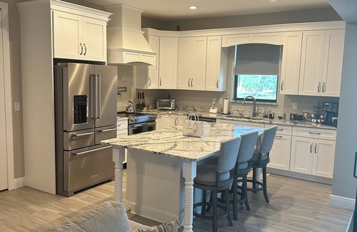 South Gulf Cove House | Brand New Luxury One Of A Kind Waterfront Home With Pool, Spa & Tiki Hut!