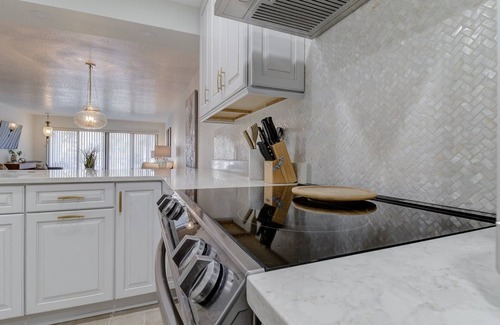 Cocoa Beach Condo | Brand New Renovated Unit with Partial Ocean View and Heated Pool, Hot Tub and Tennis Court