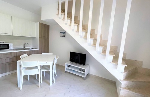 Viddalba Apartment | Brand new two-story apartment in residence with pool, equipped with washing machine