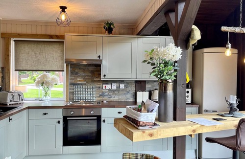 Kilmun Cottage | Breacan Lodge - a lodge that sleeps 4 guests in 2 bedrooms