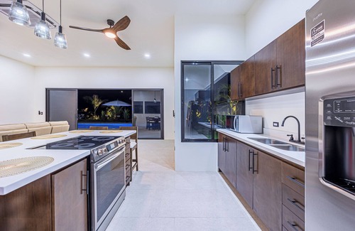 Palma Quemada House | Breathtaking Custom Home-Guest House Walk to “Playa Linda” and to “Rio Hatillo”