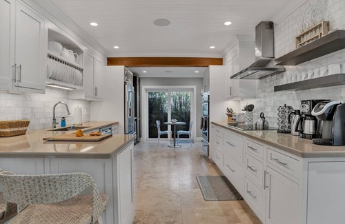 Dolphin Isles House | Breathtaking Oasis, Steps to Beach, Heated Pool, In-ground Spa VIRTUAL TOUR