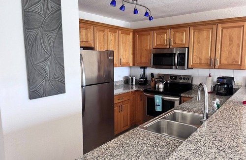 Colliers Bay Condo | Breathtaking Ocean View Beachfront Top Floor Condo