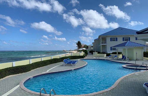 Colliers Bay Condo | Breathtaking Ocean View Beachfront Top Floor Condo