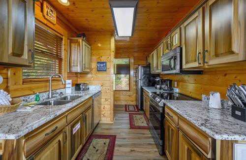 Sevierville Cabin | Breathtaking View, Free Wi-Fi, custom cabinets, private deck, 2 king suites