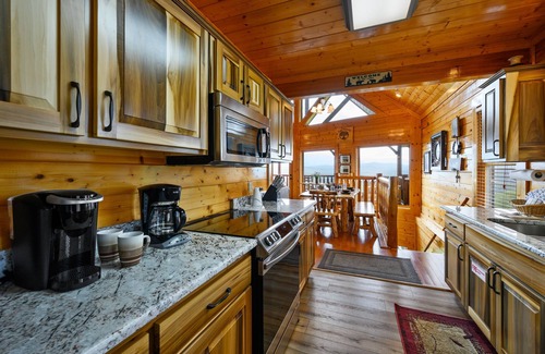 Sevierville Cabin | Breathtaking View, Free Wi-Fi, custom cabinets, private deck, 2 king suites
