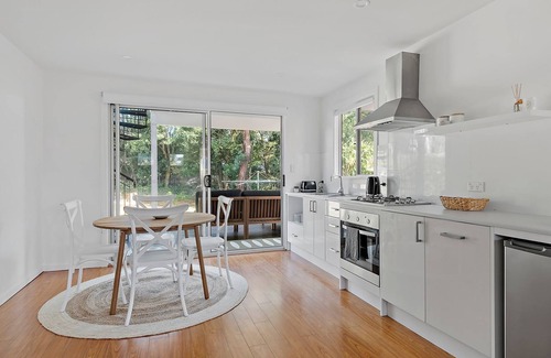 Mollymook Beach House | Breezeway Mollymook - A short walk to the beach & features an indoor & outdoor firepit!