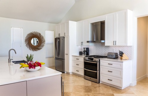 Leeward Settlement Villa | Breezy Villa is a 4 bedroom Villa with Spectacular Water Front Views