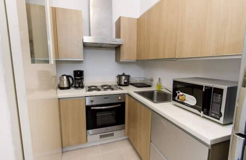 Bonifacio Global City Condo | Bright 2 Bedroom in BGC! Fast Wi-Fi & UHD TVn