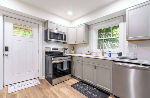 Greensboro Apartment | ‼️Bright 2BR Suite w/Parking & Backyard