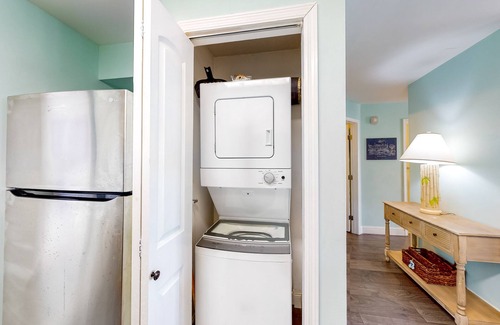 Holiday Isle Condo | Bright 2nd-floor condo with easy beach access, balcony, W/D, & central AC