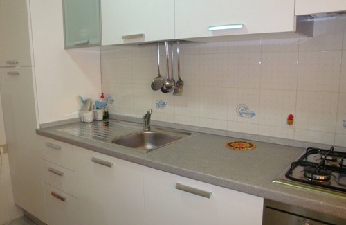 Cala Gonone Apartment | Bright and comfortable apartment, 400 meters from sea. Garden, Air-Con,Terrace.