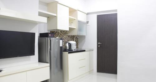 Cipaganti Apartment | Bright and Comfy 2BR The Jarrdin Cihampelas Apartment By Travelio