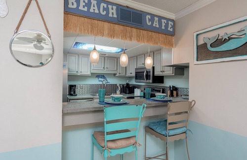 Villa Sabine Condo | Bright and Fun Beach Themed Condo - On Little Sabine Bay - Sand Dollar W107