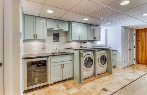 Detroit Lakes House | Bright and Modern Luxe on Long. Peloton bike in unit