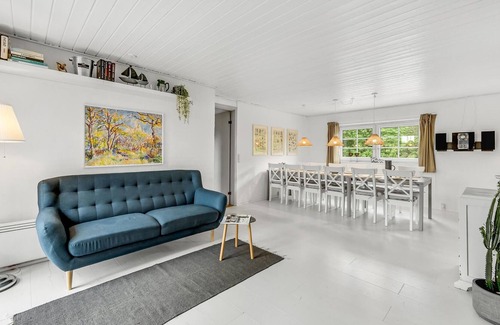 Øby House | Bright and welcoming pool house in green surroundings.