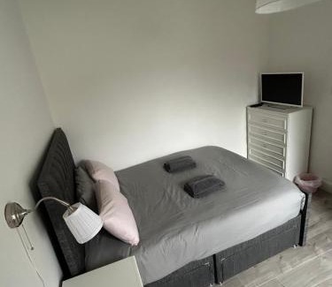 Gorgie Apartment | Bright bedroom with king side bed and share bathroom