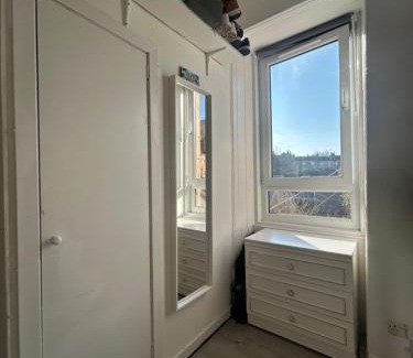 Gorgie Apartment | Bright bedroom with king side bed and share bathroom
