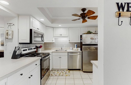 Folly Field Condo | Bright Condo with Full Kitchen, Shared Pools, Hot Tub, Beach Access, and More