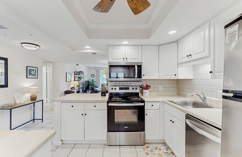 Folly Field Condo | Bright Condo with Full Kitchen, Shared Pools, Hot Tub, Beach Access, and More