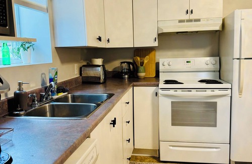 Terra Nova Apartment | Bright & Elegant, Near YYT
