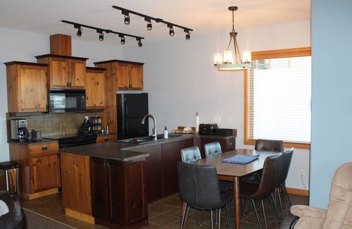 Big White Ski Resort Ski Chalet | Bright End unit Townhome, priv. hot tub, 2 parking, ski in/out, close village