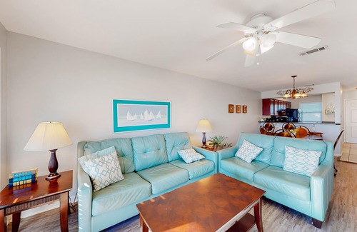 Sunnyside House | Bright Gulf-front condo with two balconies, pool, central AC, & W/D